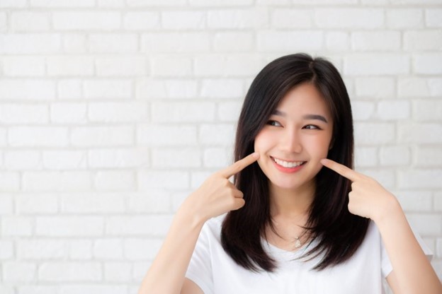 person with nice smile thanks to cosmetic dentistry